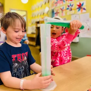 Children collaborating on science and engineering challenges