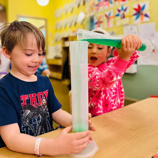 Children collaborating on science and engineering challenges